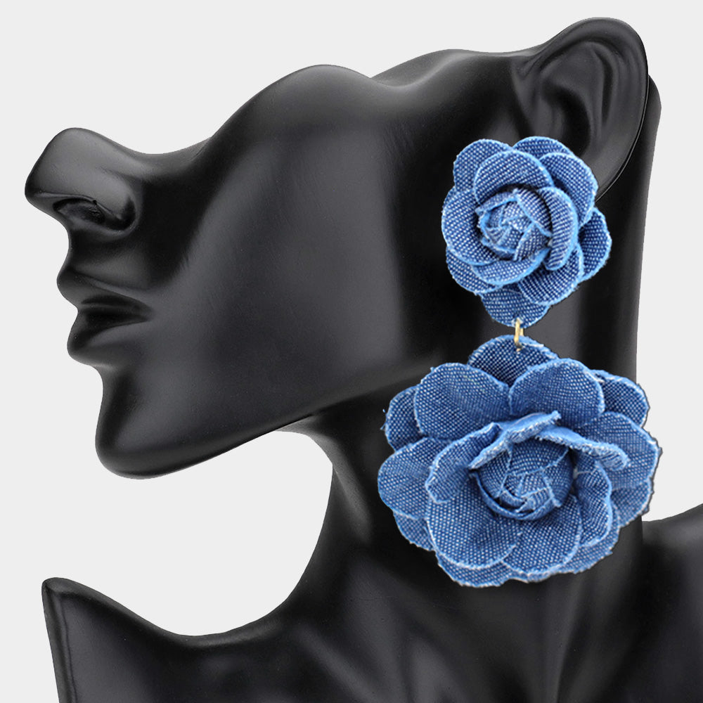 Blue denimn floral earrings displayed on a mannequin head.  