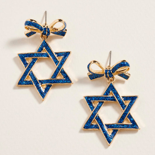 Blue Star of David earrings with gold accents on a light gray background